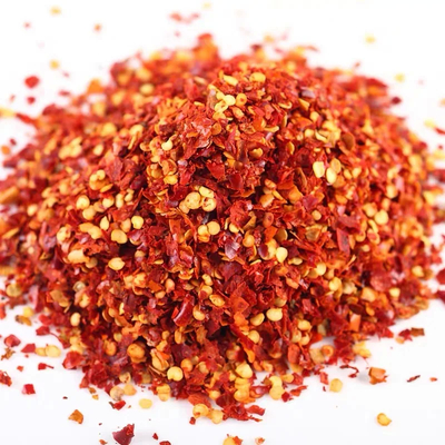 Voedingssupplement Warme chiliflakes met ingrediënten Chilipepers